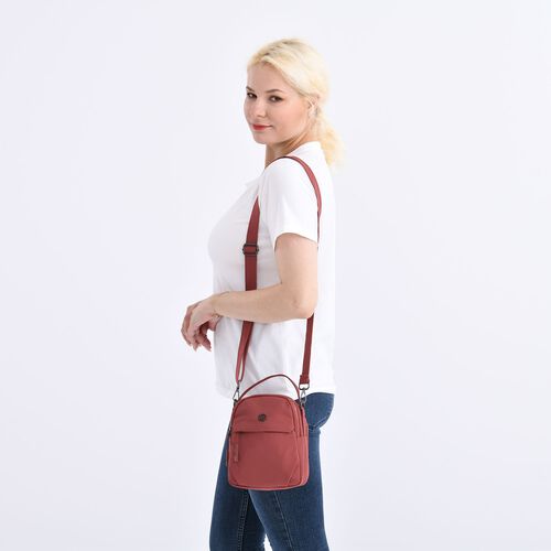 "lifestyle-Color:Brick red size/Profile:Nylon Crossbody Bag wall(exterior):Nylon  Lining(interior):Polyster Pockets(exterior):zipped-1;Pockets(interior): zipped-1. Measurement(inch):17*21*8cm  strap:cm " image number 1
