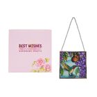 "Glass Suncatcher pendant with chain and silver frame -Square shape Size : 11.5x11.5cm Weight: 220g Material: Metal frame+ glass Color: Multicolor Design: Purple flower with brids"