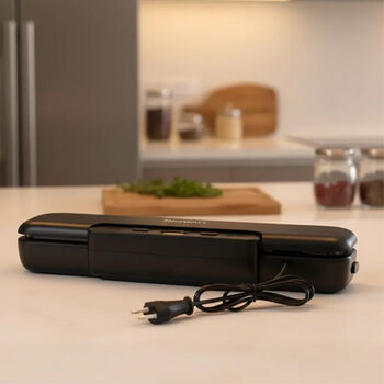 LIVMORE Vakuumierger&auml;t mit Schwei&szlig;- und Vakuumfunktion, inkl. Rollenbeutel und 10 Vakuumbeuteln, Schwarz