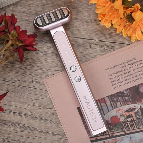 "Beautech  Ficial and Eye massager Color: Pink Material: Metal +PC plastic Bare weight :52.5g Bare machine size :158*19*25.5mm Packing weight :266g Package size :21*8.2*6cm Lighting: Red + Blue + purple Function: Heating + micropulse EMS+ vibration (3 str image number 1