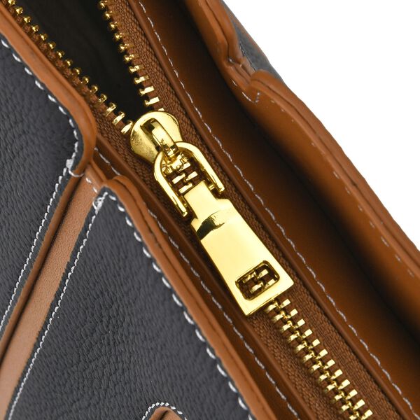 lifestyle-Color:Black with brown size/Profile: Tote bag:wall(exterior);Genuine Leather. Lining(interior):polyester  Pockets(exterior):zipped-1;(interior):Zipped-2 slip-1.Measurement(cm):  L:32*W12*H28cm.Hand strap 27cm Closure Type:zipped.zipped type: Met image number 5