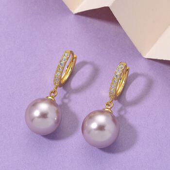 Lila Muschelkernperle und Zirkonia Ohrringe