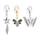 3er Set - mehrfarbige Kristall Sternschnuppe-, Biene- und Schmetterling-Schlüsselanhänger 26.60 ct