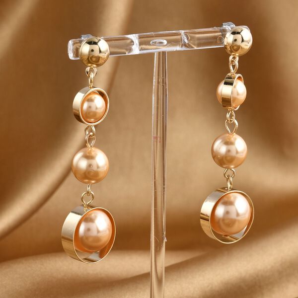 Goldene Muschelkernperlen-Ohrringe - 35 ct. image number 2