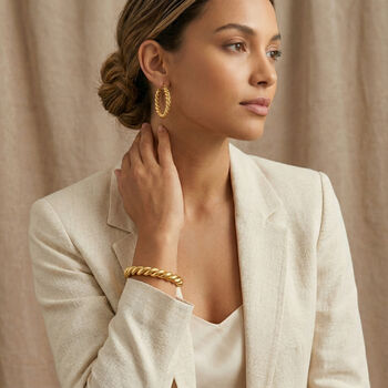 2er Set - Gedrehte Armreif und Ohrringe, Edelstahl, goldfarben