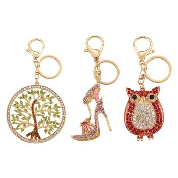 Mystischer Wei&szlig;er Kristall Schl&uuml;sselanh&auml;nger, emaillierte Legierung, goldfarben, Lebensbaum