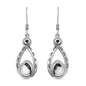 Weiße Büffel und schwarze Spinell-Ohrringe - 1,58 ct.