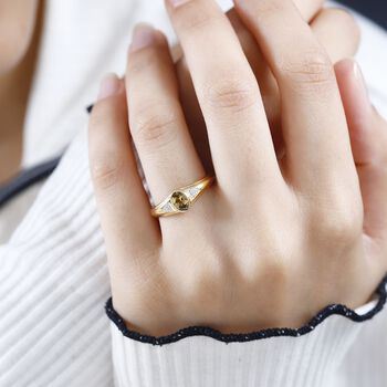 AA nat&uuml;rlicher goldener Tansanit und Zirkon-Ring - 0,49 ct.