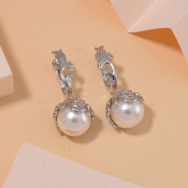 Weiße Muschelkernperle Ohrringe Messing image number 2