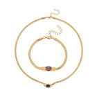 2-teiliges Schmuckset, Halskette und Armband mit Roter Kristallen, Edelstahl goldfarben