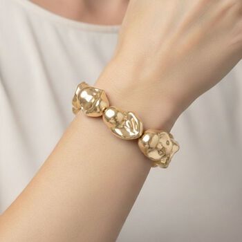 Flexibles goldenes Fancy Muschelkernperle Armband