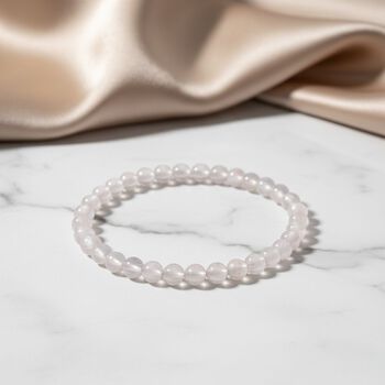 Flexibles AAA Regenbogen Mondstein Armband - 50 ct.