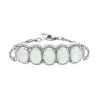 Künstliches, weißes Opal und Kristall-Armband, ca. 18+2.5 cm, silberfarben, ca. 7.00 ct