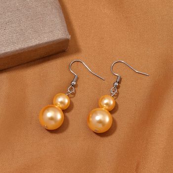 Goldene Muschelkernperlen Ohrringe