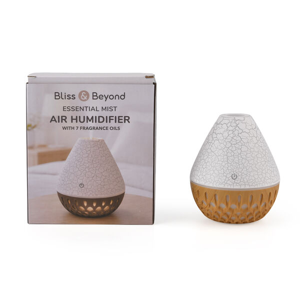 "Humidifier with 7 Essential Oil   Product Size: 100*100*117mm Color Box Size:105*135*155mm  Net weight:120g+245g=360g Water Capacity: 200ml Power: 3-5W, DC 5V/1A Colorful light Changing 3 hours Automatic Power Off" image number 9