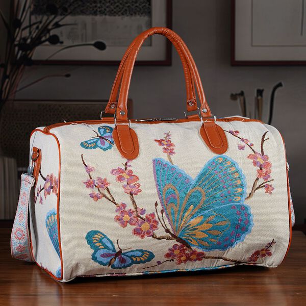 "Life style Color:White with blue butterfly print /Profile:Duffel bag wall(exterior):Polyester    Lining(interior): polyester; Pockets(exterior):Zipped-1 Pockets(interior):none Measurement:45*23*27cm         " image number 1
