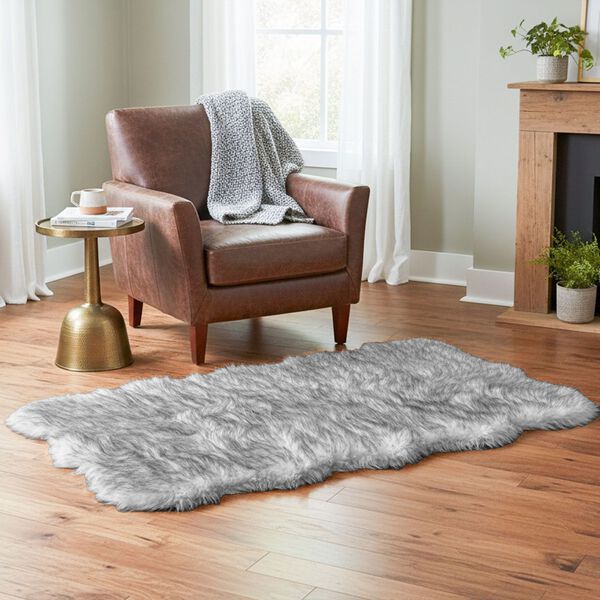 LIVMORE - Luxury Edition: Wolkenweicher Kunstfell Teppich, 100x180cm, Schwarz