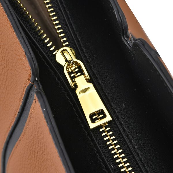 lifestyle-Color:Brown with black size/Profile: Tote bag:wall(exterior);Genuine Leather. Lining(interior):polyester  Pockets(exterior):zipped-1;(interior):Zipped-2 slip-1.Measurement(cm):  L:32*W12*H28cm.Hand strap 27cm Closure Type:zipped.zipped type: Met image number 5