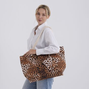 " lifestyle-Color:brown Leopard print;   Size/Profile:Set of 2 Polyester tote bag ;  Wall (exterior):Polyester,Lining (Interior):polyester  Tote bag Pockets (exterior):Zipped-1 Mini bag Pockets (exterior):zipped-1; big  size:56*36*16 cm  small size:15*12c