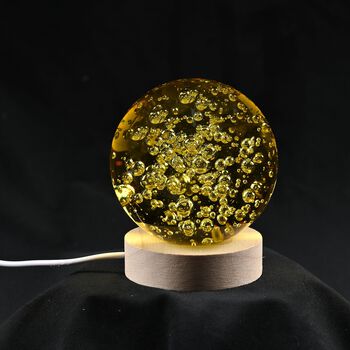Kristallkugel in gelb mit LED Licht