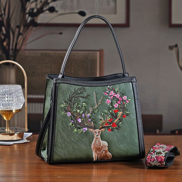 "PU Embroidered crossbody bag Color:Green Size:  25*11*21cm   Wall: PU Lining: Polyester Exterior:zipped-1,pocket-1 Interior: zipped-2,slid-1 Long Shoulder strap:130cm " image number 1