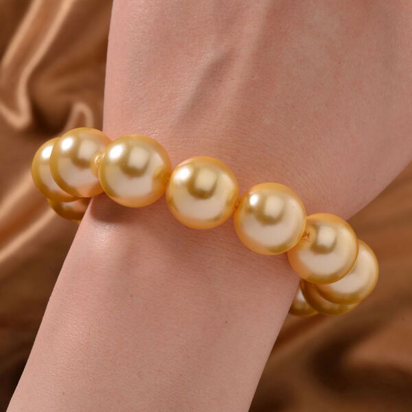 Goldene Muschelkernperle Armband Flexibel image number 2