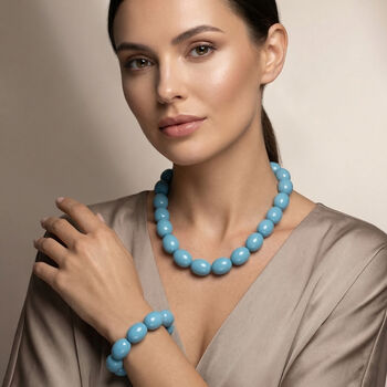 Sleeping Beauty t&uuml;rkisfarbene Oval Muschelkernperle 50cm Halskette und flexibles Armband