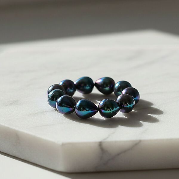 Flexibles pfaufarbenes Tropfen Muschelkernperle Armband image number 2