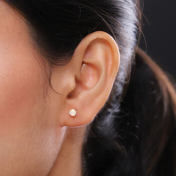 Nat&uuml;rliche, &auml;thiopische Opal-Ohrstecker, 375 Gelbgold ca. 0.34 ct