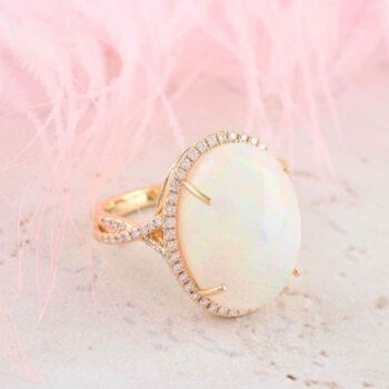 ILIANA zertifizierter und gepr&uuml;fter AAA nat&uuml;rlicher, &auml;thiopischer Welo Opal und SI-GH Diamant Ring in 750 Gold - 9,50 ct.