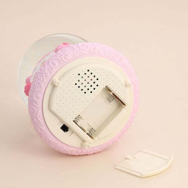 Glitzerkugel Musik und Licht, 15x10 cm, M&auml;dchen und Vogel image number 7