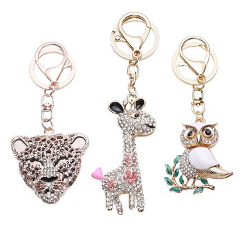 Schwarze Kristall und orange Zirkonia-Schl&uuml;sselanh&auml;nger, ca. 1,00 ct