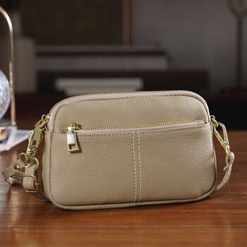 "Genuine Leather crossbody bag Color: Khaki Size:21*5*14cm        Wall: Genuine Leather Lining: Polyester Exterior:zipped-3 Interior:zipped-1,slid-1"