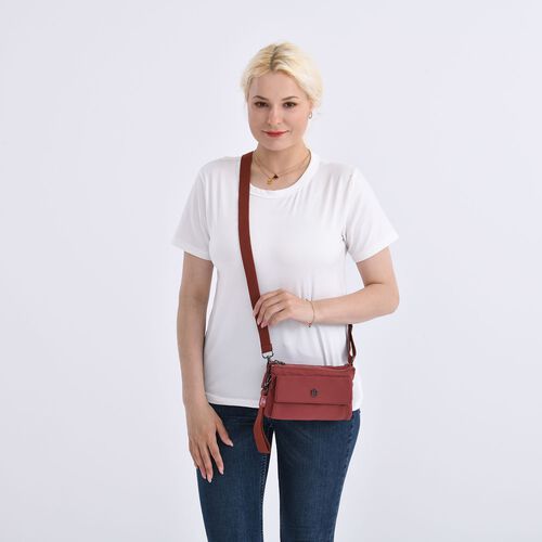 "lifestyle-Color:Brick red size/Profile:Nylon Crossbody Bag wall(exterior):Nylon  Lining(interior):Polyster Pockets(exterior):zipped-2,pocket-1;Pockets(interior): zipped-1. Measurement(inch):20*12*3.5cm  strap:137cm " image number 1