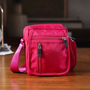 Umh&auml;ngetasche mit mehreren Rei&szlig;verschlussf&auml;chern und RFID-Schutz, 12,5x6x16cm, Rosenrot