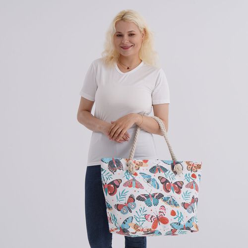  lifestyle-Color:white with butterfly print ;  Size/Profile:tote bag; Wall (exterior):Polyester,Lining (Interior):polyester  Pockets (exterior):Zipped-1;Pockets (interior):slip-1;Measurement (inches):15.95*7.08*14.96inch;  Closure Type: zipped; Hardware T image number 1