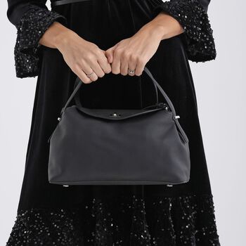 "Genuine Leather crossbody bag Color:Black Size:32*19*11cm        Wall: Genuine Leather Lining: Polyester Exterior:lock-1 Interior: zipped-1,slid-1"