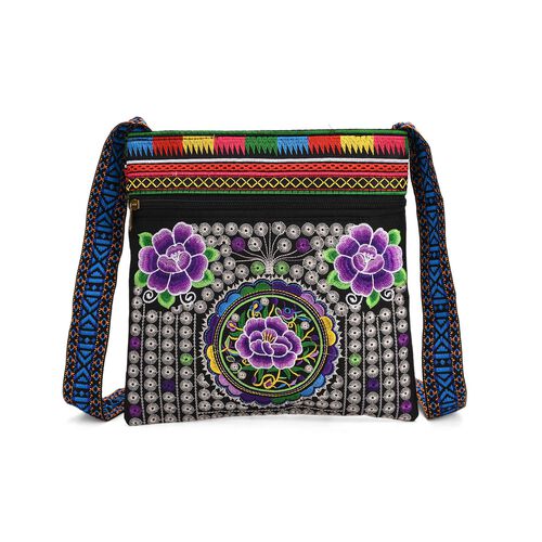 "Life style Color:Print A /Profile:Polyester Crossbody bag wall(exterior):Polyester    Lining(interior): polyester; Pockets(exterior):Zipped-2;,Pockets(interior):none Measurement:23*24cm         "