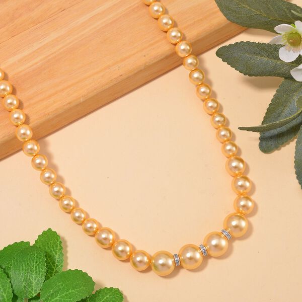 Goldene Muschelkernperlen und wei&szlig;e Kristall, 45+5 cm image number 1